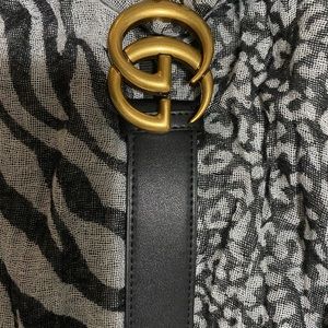 Black GG belt. 42 inches long… 1 1/2 inches wide.